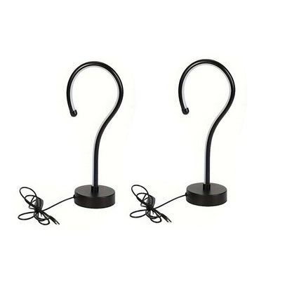 Two black metal hooks on stands with wires on a white background
